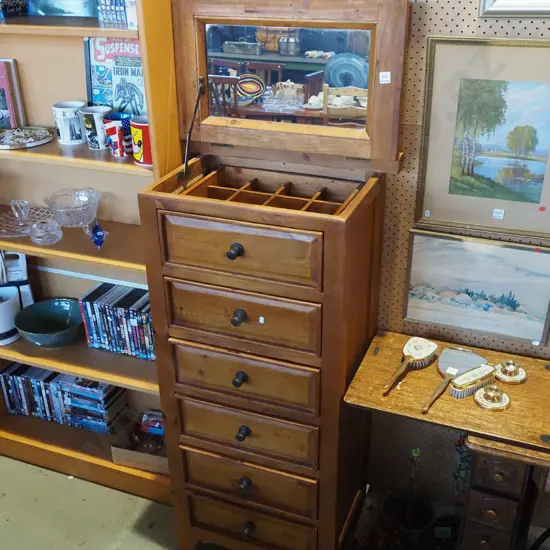 solid pine 6 drawer tall boy - 1 drawer has fitted interior - top lifts up to expose mirror