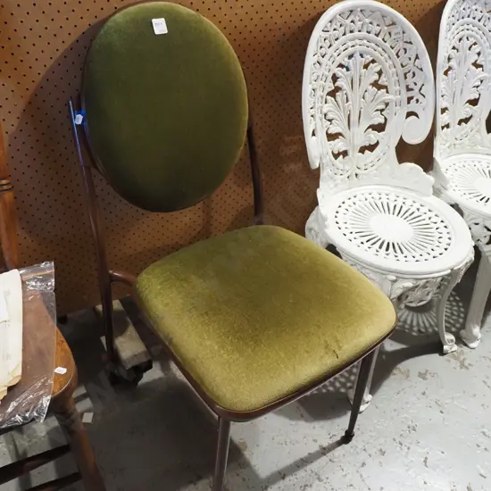 metal, plastic green reception chair - rip in fabric