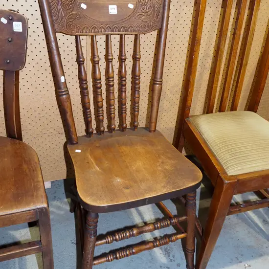 spindle back and pressed wood chair
