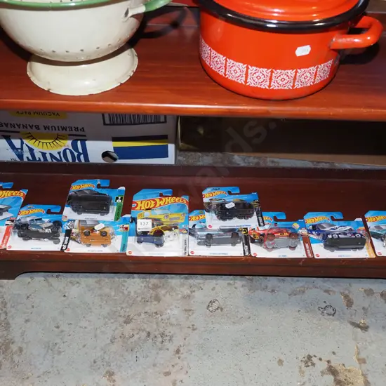 10x as new carded Hotwheels vehicles