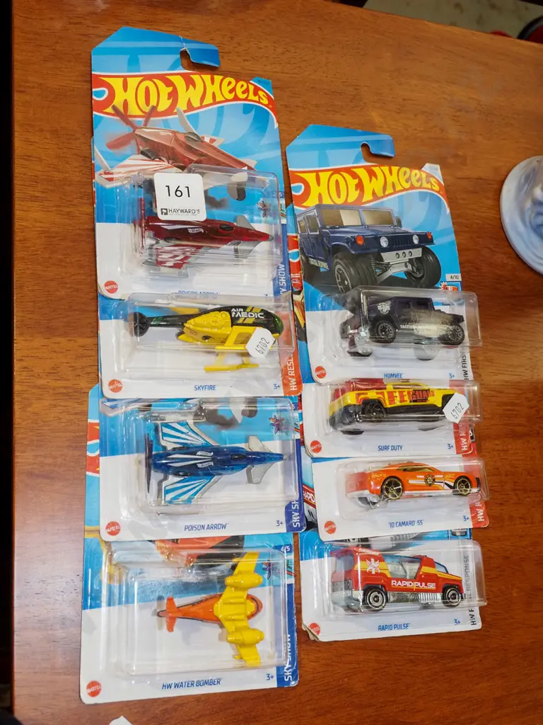8x as new carded Hotwheels vehicles Image 1++