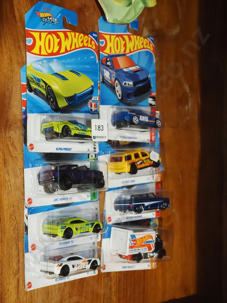 8x as new carded Hotwheels vehicles Image 1++