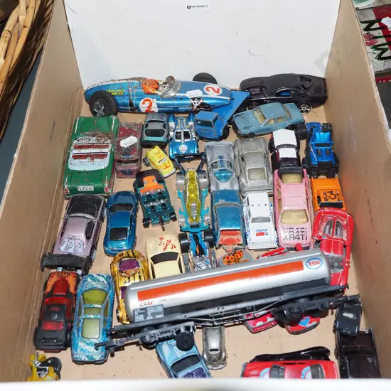 box of toy vehicles