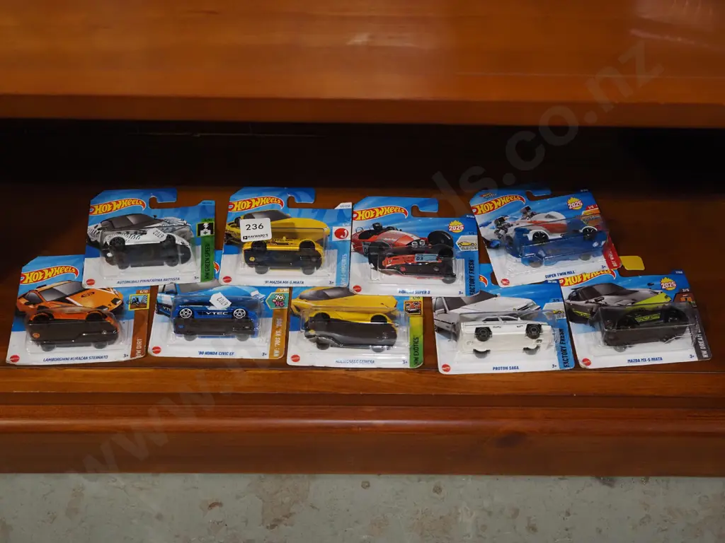 9x as new carded Hotwheels vehicles Image 1++