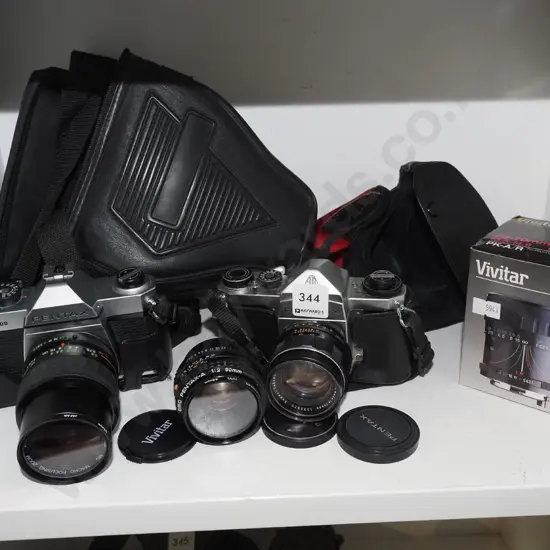 2x Pentax 35mm cameras, case, additional lens