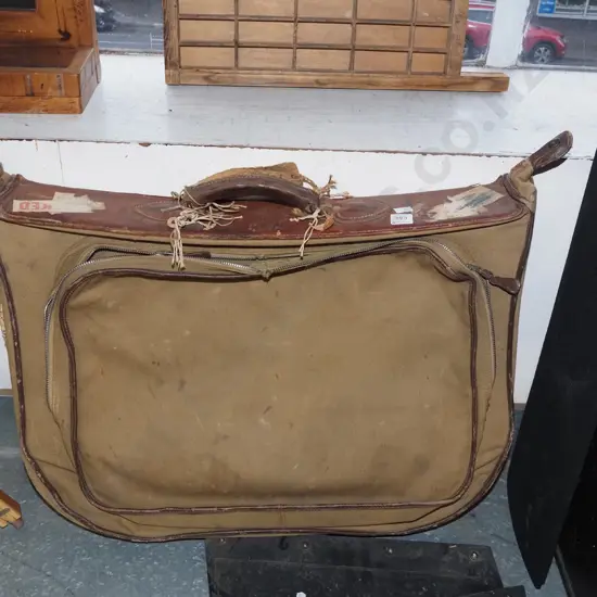 vintage canvas and leather suitcase