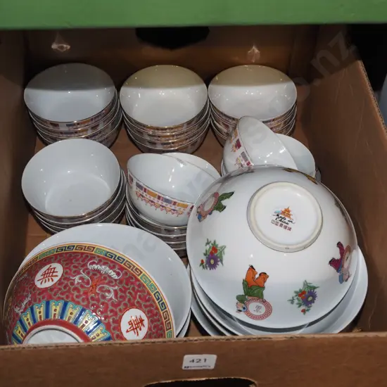 box of various Asian bowls