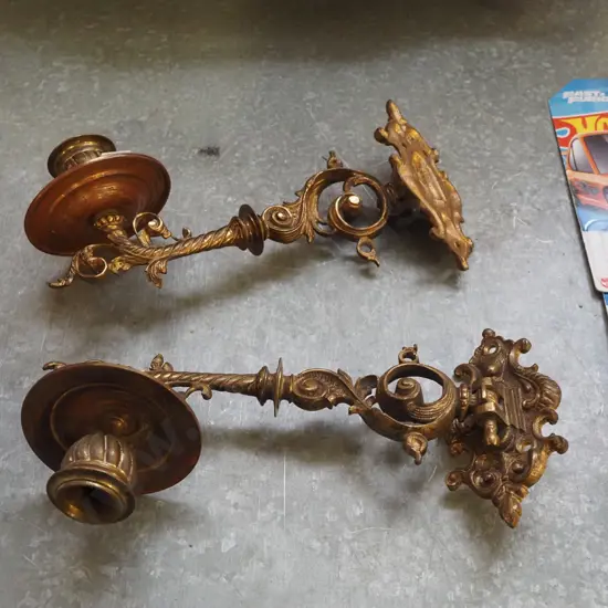 pair of cast brass piano sconces