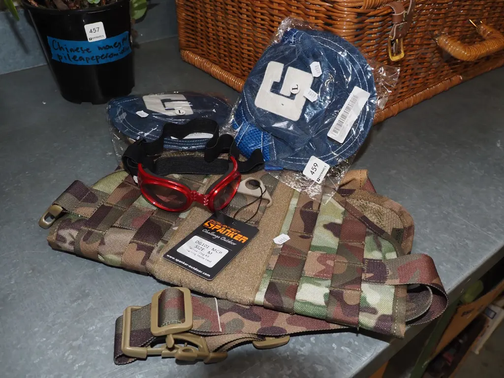 camoflauge dog jacket, dog caps, pair of goggles Image 1++