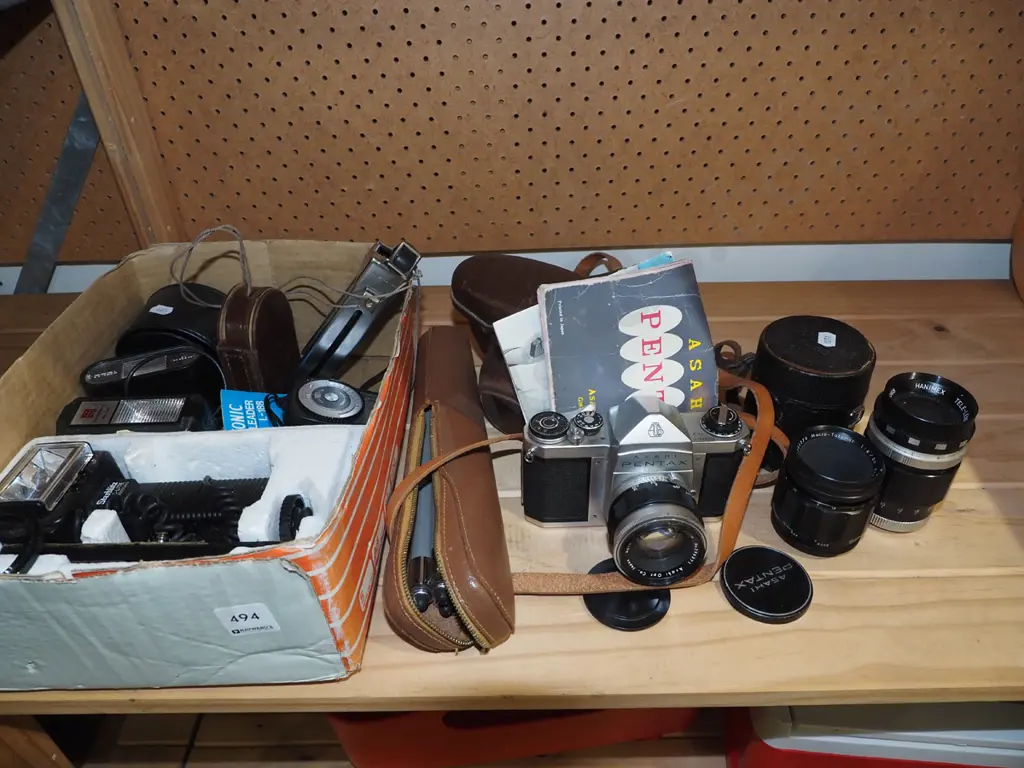 box; Pentax 35mm camera, lenses, small tripod etc Image 1++