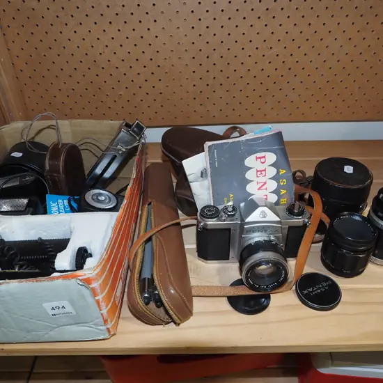 box; Pentax 35mm camera, lenses, small tripod etc
