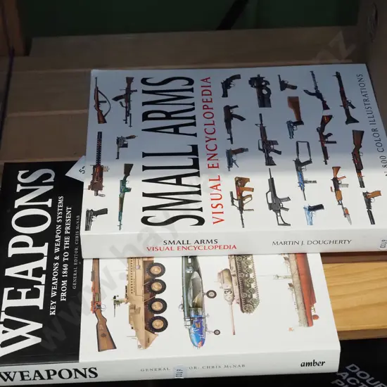 2x books - weapons/arms