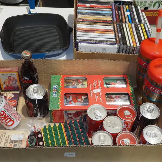 box; Coca Cola cans, promotional tumblers, palying cards etc
