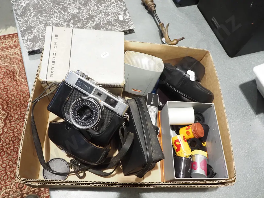 box; Konica 35mm camera, flash, films etc Image 1++