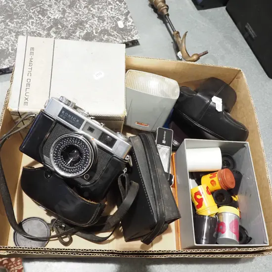 box; Konica 35mm camera, flash, films etc