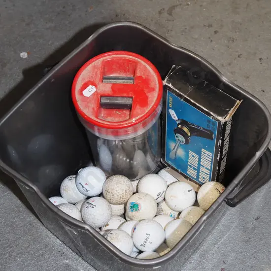 plastic tub; golf balls, picture hooks etc