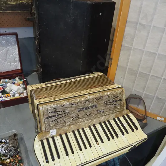 Hohner accordion and case