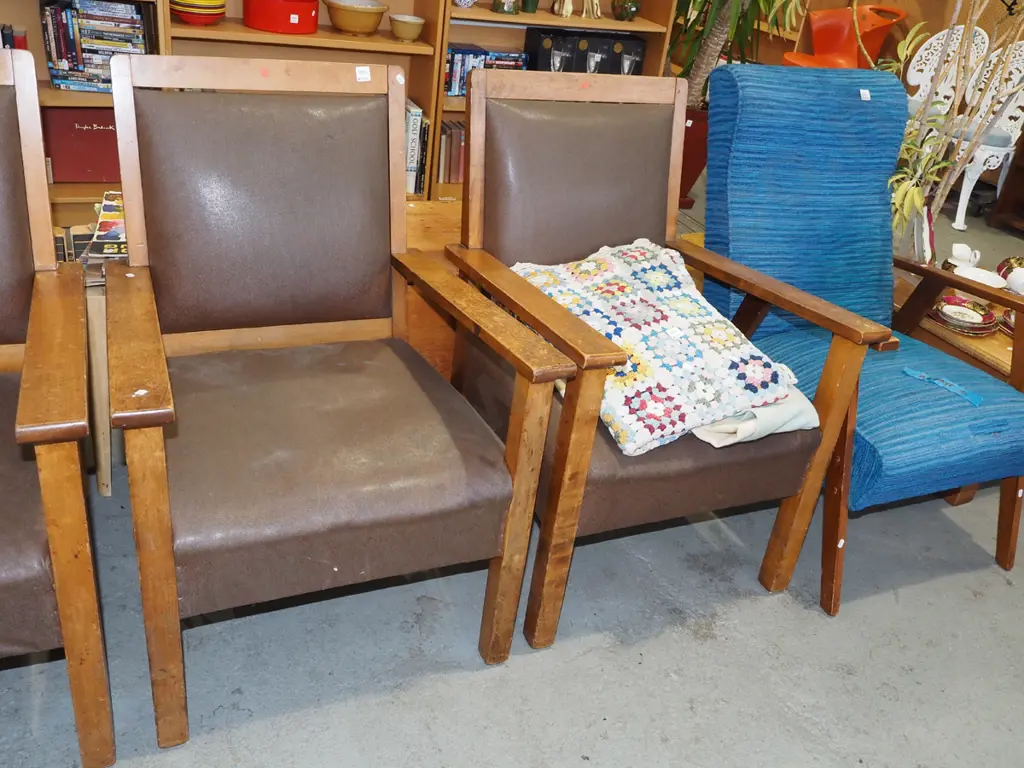 pair of rimu and brown vinyl armchairs Image 1++