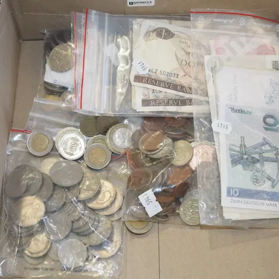 box of banknotes and coins