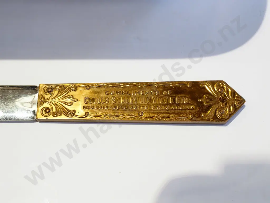 plated dish, lighters, letter opener, ornamental metal rifle Image 1++