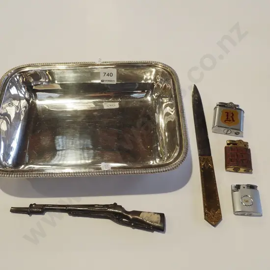 plated dish, lighters, letter opener, ornamental metal rifle