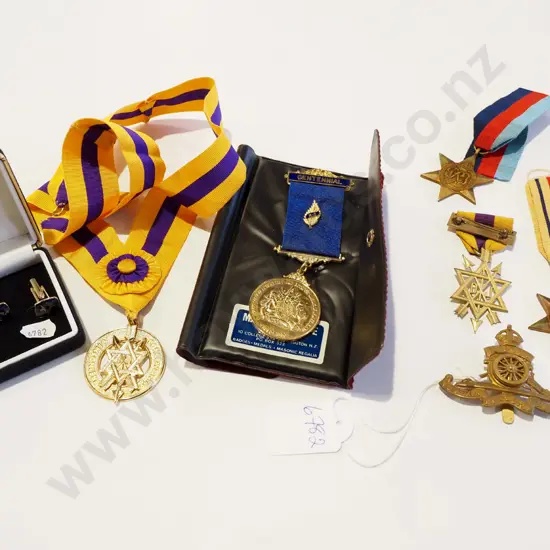 tray; cuff links and medals