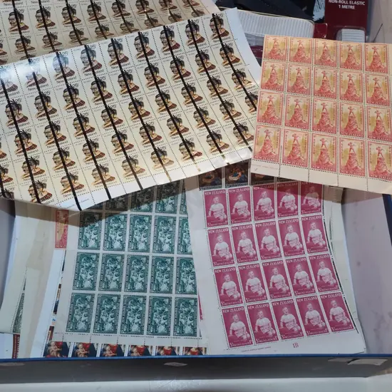 various sheets of NZ stamps