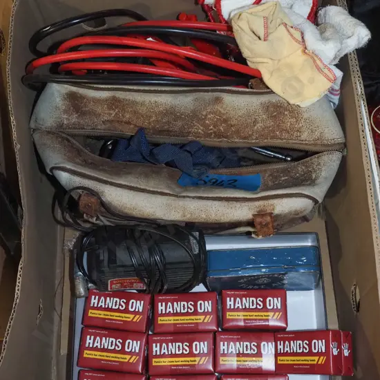 box; hands on pumice bar, tyre inflater, jumper leads etc