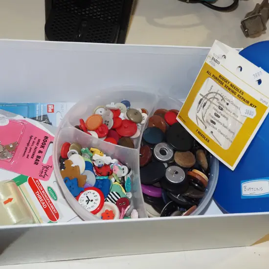 box; buttons, needles, thread etc