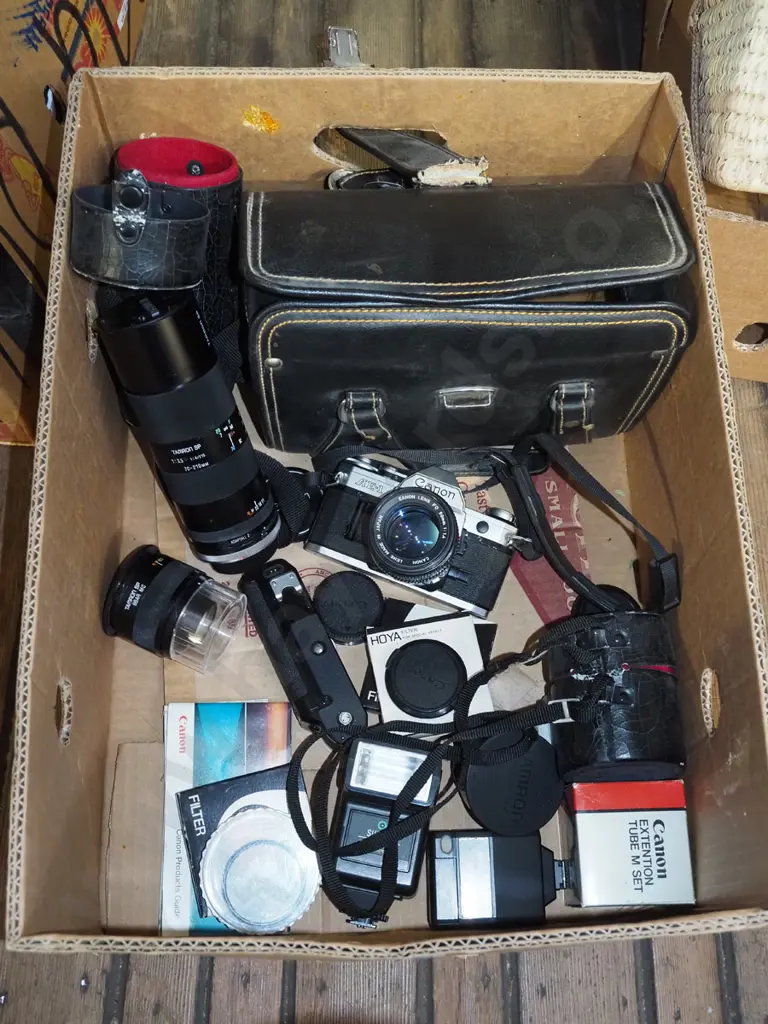 box; Canon 35mm camera, camera bag, additional lenses etc Image 1++