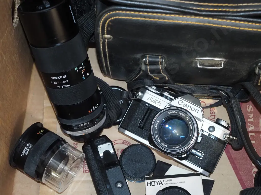 box; Canon 35mm camera, camera bag, additional lenses etc Image 1++