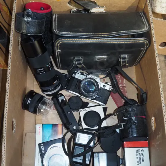 box; Canon 35mm camera, camera bag, additional lenses etc