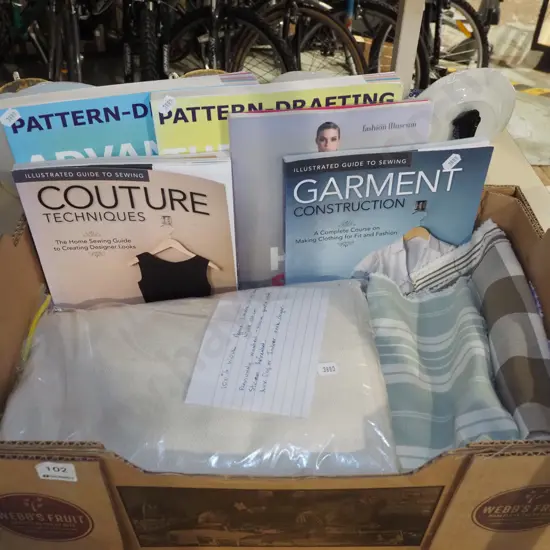 box; various fabric pieces, sewing hooks