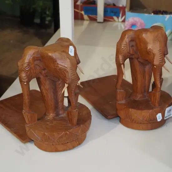 2x carved wooden elephant themed bookends - damage to some trunks