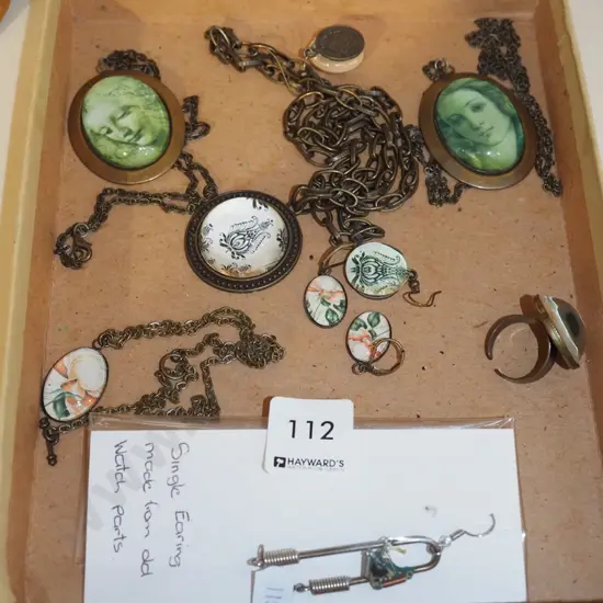 box of pendants, earring made from watch parts