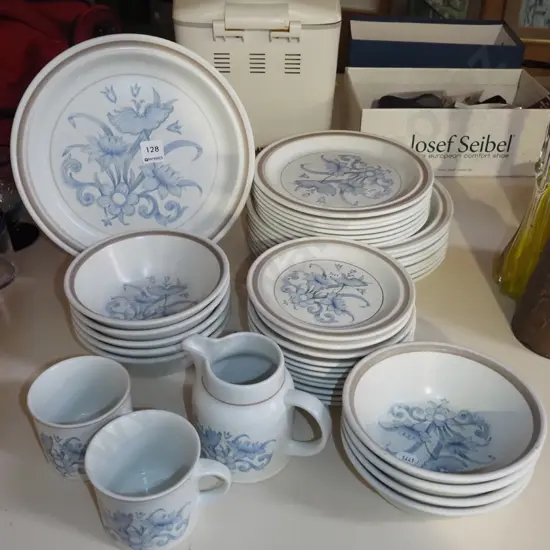 assorted Royal Doulton stoneware dinner items; plates, bowls etc