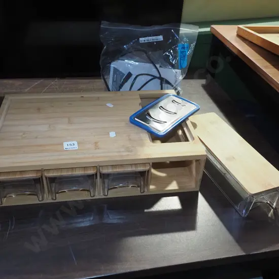 bamboo cutting board with lidded storage containers