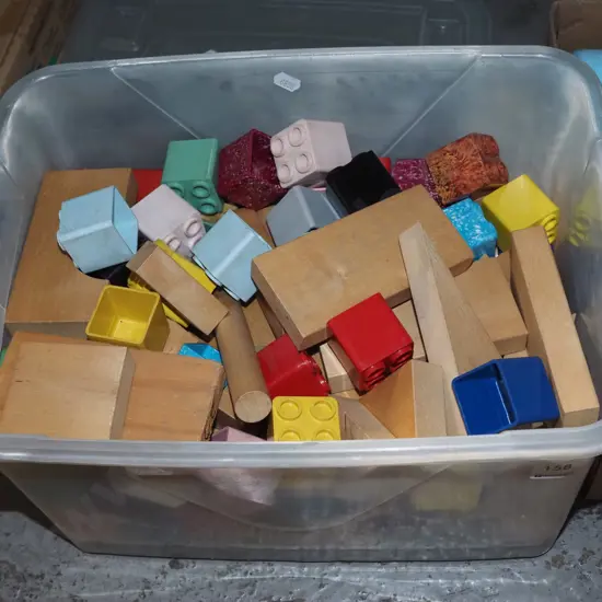 box; wooden and plastic building blocks