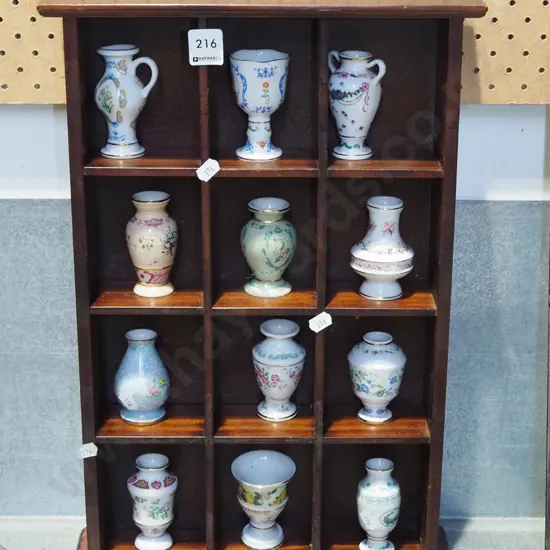 small pine shelves with 12 small vases H470 