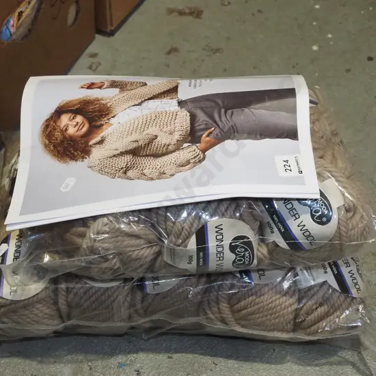2x bags of wonder wool and cardigan pattern
