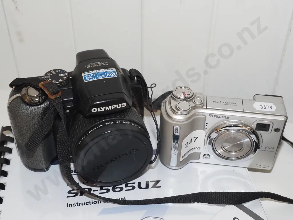 Fuji digital camera, Olympus digital camera - both with instructions Image 1++