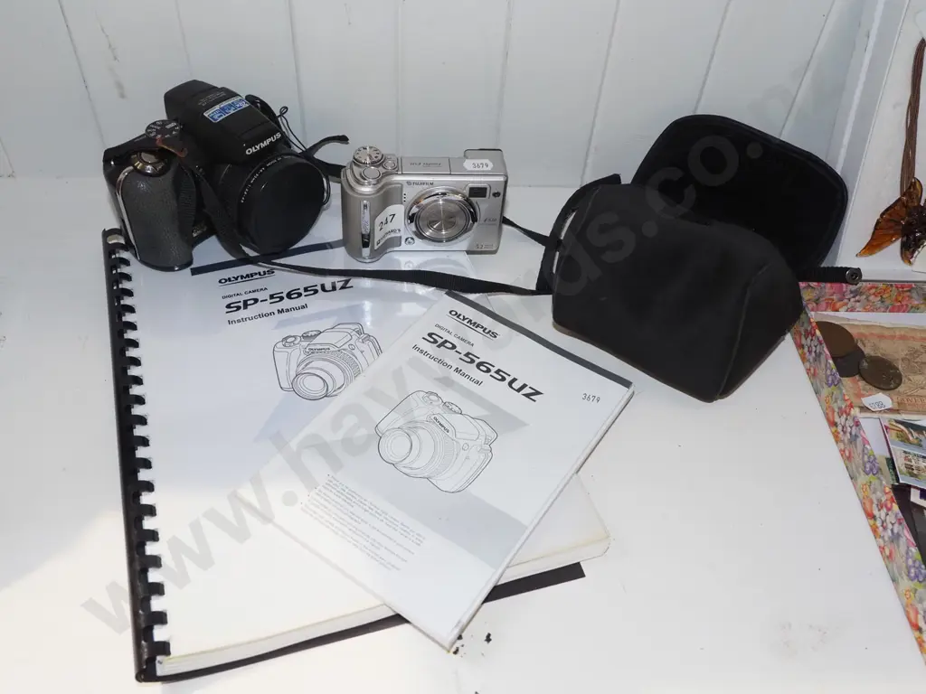 Fuji digital camera, Olympus digital camera - both with instructions Image 1++