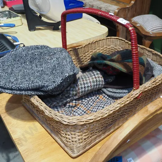 cane basket filled with 6 gents hats
