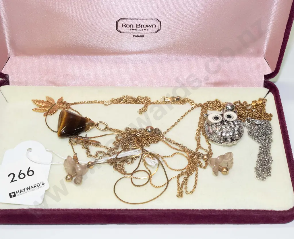 tray; assorted necklaces with pendants Image 1++