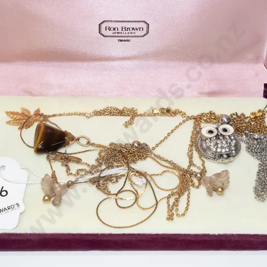 tray; assorted necklaces with pendants