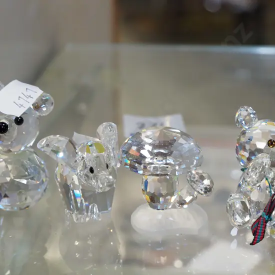 4x small Swarovski figurines