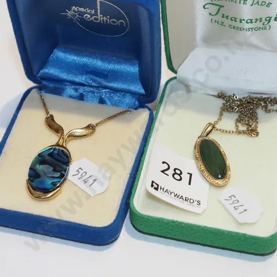 2x cased pendants; plated nephrite, plated paua