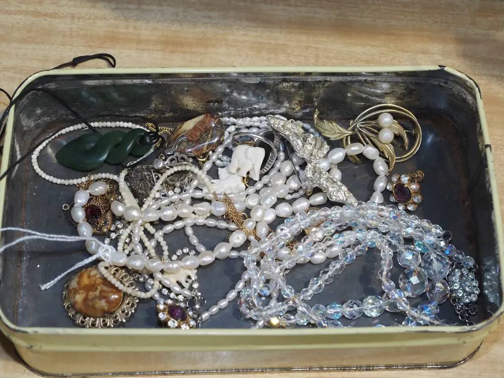 tin of costume jewellery Image 1++