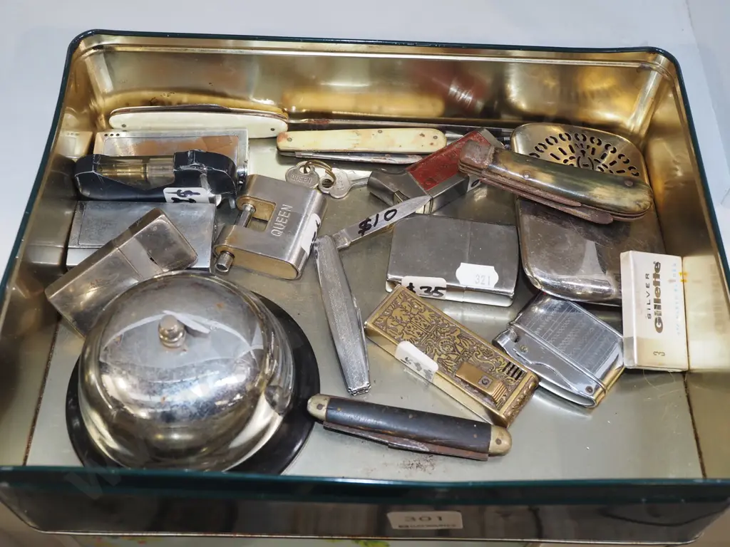 tin; lighters, bell, hand warmer etc Image 1++