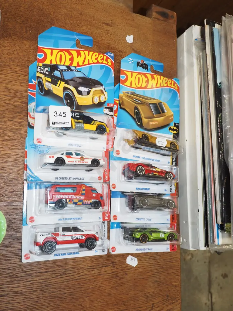8x carded Hotwheels vehicles Image 1++